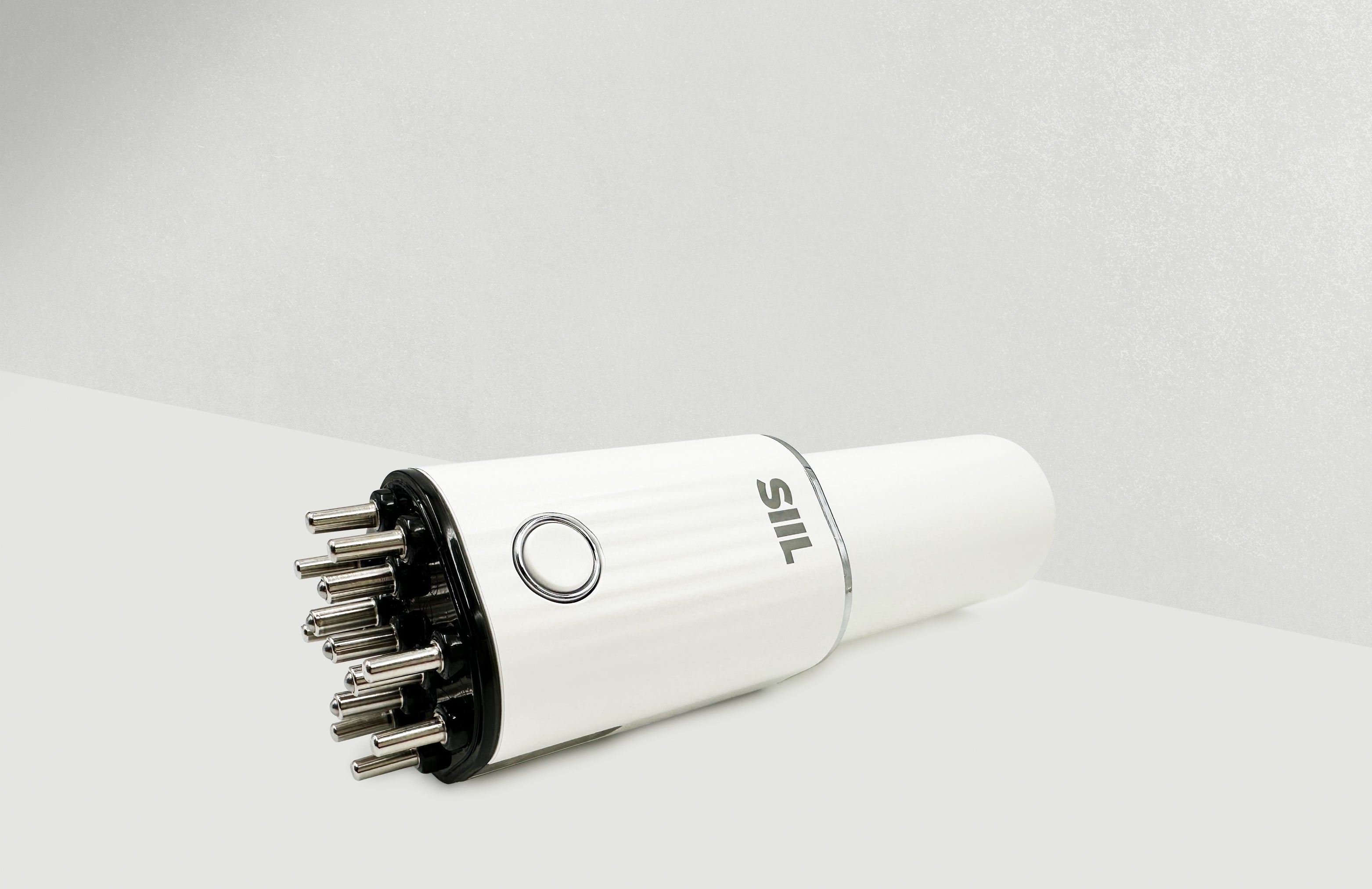 Cepillo masajeador LED para el cuero cabelludo SIIL